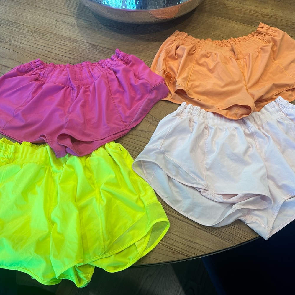Lululemon sz 14 Lot of 4 Shorts (yellow, orange, dark & lt pink) Excellent Con